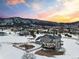 Breathtaking mountain views surround this property, showcasing a fenced yard and outdoor playset, perfect for Gathering fun at 931 Forest View Rd, Monument, CO 80132