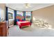 Bedroom with bay windows offering natural light and mountain views at 931 Forest View Rd, Monument, CO 80132