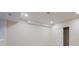 Spacious bedroom featuring neutral walls and an open sliding door at 17853 W 77Th Ln, Arvada, CO 80007