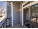 Private balcony with sliding door and views of the outdoors at 7481 Singing Hills Dr, Boulder, CO 80301