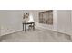 Bright bedroom featuring a desk, carpeted floors, and a window with blinds at 7481 Singing Hills Dr, Boulder, CO 80301