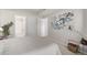 This bedroom offers access to a bathroom and closet with an airy and inviting space at 7481 Singing Hills Dr, Boulder, CO 80301