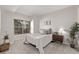 This bedroom offers a cozy retreat with soft textures and a large window at 7481 Singing Hills Dr, Boulder, CO 80301