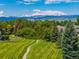 Beautiful landscaping and mountain views, adding to the appeal of the community at 7481 Singing Hills Dr, Boulder, CO 80301