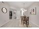 Cozy dining room with round table, carpet, and contemporary decor at 7481 Singing Hills Dr, Boulder, CO 80301