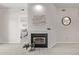 Living room features a modern fireplace, neutral paint and carpet, and decorative accents at 7481 Singing Hills Dr, Boulder, CO 80301
