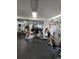 Gym featuring exercise equipment, mirrored walls, and a rubber floor at 7481 Singing Hills Dr, Boulder, CO 80301