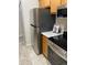 Modern kitchen with stainless steel refrigerator and stove at 7481 Singing Hills Dr, Boulder, CO 80301