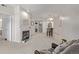 Inviting living room with fireplace, dining area, and an open layout at 7481 Singing Hills Dr, Boulder, CO 80301