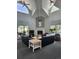 Bright community lounge featuring vaulted ceilings, a fireplace, and comfortable seating at 7481 Singing Hills Dr, Boulder, CO 80301