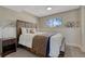 Comfortable bedroom with a large bed, natural light, and modern decor at 280 Jupiter Dr, Lone Tree, CO 80124
