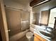 Bathroom with shower/tub combo and vanity at 9579 W Coal Mine Ave # D, Littleton, CO 80123