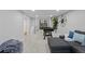 Open basement featuring a foosball table, comfortable seating, and stylish decor at 2385 S Marion St, Denver, CO 80210