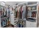 Organized walk-in closet with custom shelving, drawers, and ample storage space at 2385 S Marion St, Denver, CO 80210