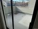 Balcony with concrete flooring, vinyl siding and view of surrounding community at 942 S Walden St # 206, Aurora, CO 80017