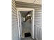Condo entryway featuring neutral walls and floors with a staircase leading upstairs at 942 S Walden St # 206, Aurora, CO 80017