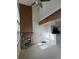 Inviting living room boasts a stone fireplace, high ceilings and natural light at 942 S Walden St # 206, Aurora, CO 80017
