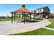 Community gazebo with picnic tables and benches, offering a relaxing outdoor space for residents at 12777 Ulster St, Thornton, CO 80602