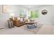Inviting living room with comfortable seating and large windows at 12777 Ulster St, Thornton, CO 80602