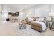 Open-concept living room showcasing modern furnishings and ample space at 12777 Ulster St, Thornton, CO 80602