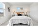 Serene main bedroom with neutral tones and abundant natural light at 12777 Ulster St, Thornton, CO 80602