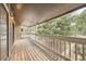 Cozy balcony with wooden flooring and railings, offering a tranquil outdoor retreat at 18073 E Ohio Ave # 203, Aurora, CO 80017