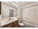 Bathroom featuring a shower/tub and a single sink vanity with good lighting at 18073 E Ohio Ave # 203, Aurora, CO 80017