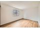 Bright bedroom with a large window and modern flooring at 18073 E Ohio Ave # 203, Aurora, CO 80017