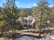 Luxury home nestled in a mountain setting with stunning views at 25220 Montane Dr, Golden, CO 80401