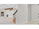 Finished basement showcasing a staircase, fireplace, and built-in shelving at 25220 Montane Dr, Golden, CO 80401