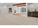 Finished basement with wet bar, fireplace, and office area at 25220 Montane Dr, Golden, CO 80401
