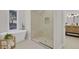 Modern bathroom with a soaking tub, walk-in shower, and stylish vanity at 25220 Montane Dr, Golden, CO 80401