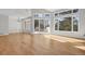Sunlit dining area with hardwood floors and stunning views at 25220 Montane Dr, Golden, CO 80401