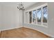 Elegant dining room with hardwood floors and bay window at 25220 Montane Dr, Golden, CO 80401