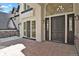 Elegant home exterior with stone accents and a covered entryway at 25220 Montane Dr, Golden, CO 80401