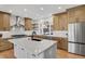 Gourmet kitchen boasts stainless steel appliances and custom cabinetry at 25220 Montane Dr, Golden, CO 80401