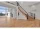 Spacious living room with hardwood floors and large windows at 25220 Montane Dr, Golden, CO 80401