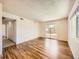 Spacious living room with sliding glass doors to a balcony offering ample natural light at 7755 E Quincy Ave # 301A7, Denver, CO 80237