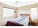 Bedroom with comfortable bed, side tables, and natural light, creating a relaxing atmosphere at 9469 W Ute Dr, Littleton, CO 80128