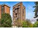 Exterior shot of a tall building featuring unique architectural details and multiple balconies at 1111 Race St # 6B, Denver, CO 80206