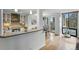 Open floor plan showcasing a modern living room and dining area with natural light at 1111 Race St # 6B, Denver, CO 80206
