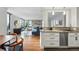 Open concept living area with a modern kitchen and comfortable living space at 1111 Race St # 6B, Denver, CO 80206