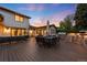 Inviting backyard patio with seating, dining area, and built-in outdoor kitchen, perfect for entertaining at 5810 S Galena St, Greenwood Village, CO 80111