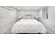 Cozy bedroom with neutral tones, a comfortable queen bed, and soft lighting at 5810 S Galena St, Greenwood Village, CO 80111