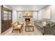 Cozy living room with stone fireplace, hardwood floors, and comfortable seating at 5810 S Galena St, Greenwood Village, CO 80111