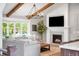 Comfortable living room featuring a fireplace, hardwood floors, and lots of natural light at 5810 S Galena St, Greenwood Village, CO 80111