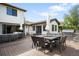Expansive deck with comfortable seating, dining area, and built-in grill at 5810 S Galena St, Greenwood Village, CO 80111