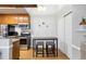 Kitchen featuring stainless steel appliances, a granite counter top, and a breakfast table with stools at 6705 S Field St # 822, Littleton, CO 80128