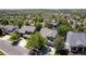 Aerial view of the neighborhood with beautiful homes and lush green trees at 20234 E Lake Cir, Centennial, CO 80016