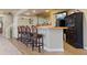Custom bar area with seating and storage, perfect for entertaining guests at 20234 E Lake Cir, Centennial, CO 80016
